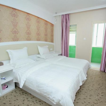 Xinghe Xinfeng Hotel Guangzhou Oda fotoğraf