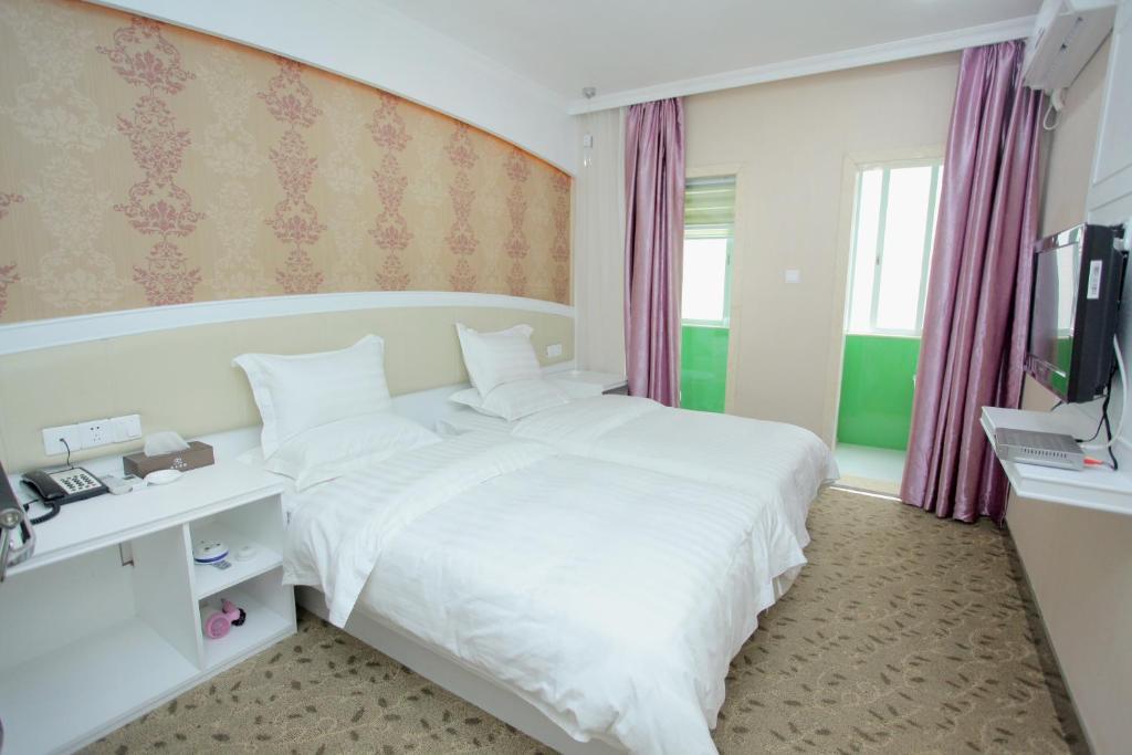 Xinghe Xinfeng Hotel Guangzhou Oda fotoğraf