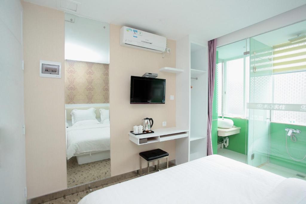 Xinghe Xinfeng Hotel Guangzhou Oda fotoğraf